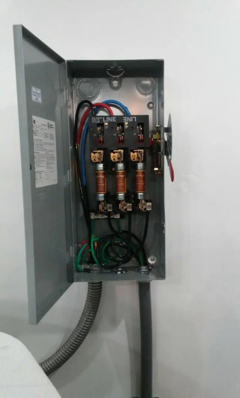 Three-phase disconnect switch installed for Smoke Detector Installation in Forest City